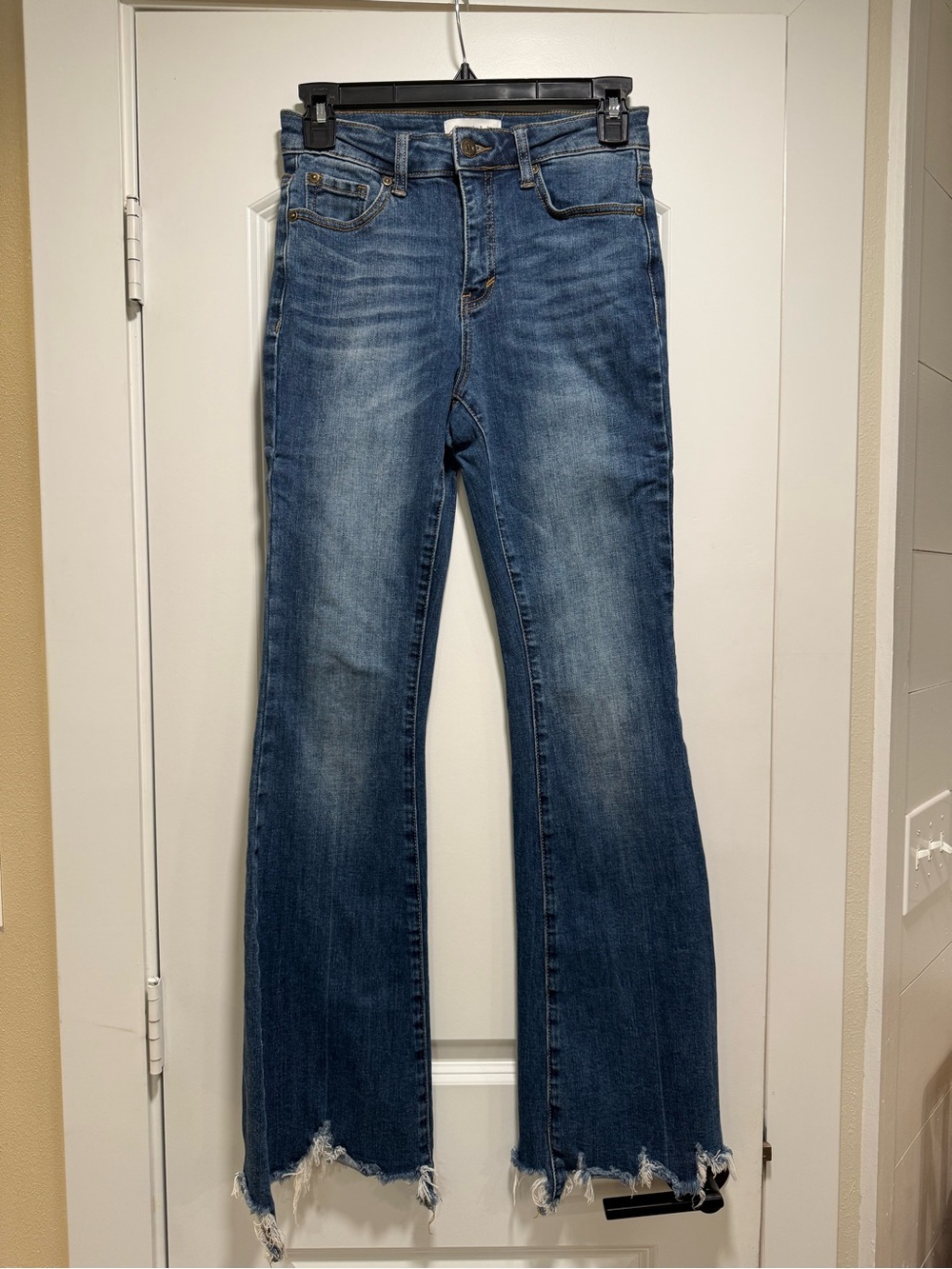 Women's Blue Distressed Flare Jeans with Raw Hem